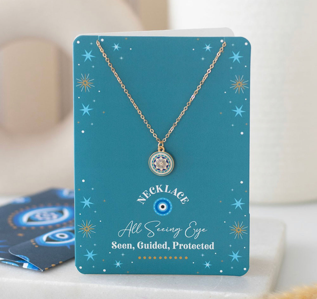 ALL SEEING EYE NECKLACE ON GREETING CARD