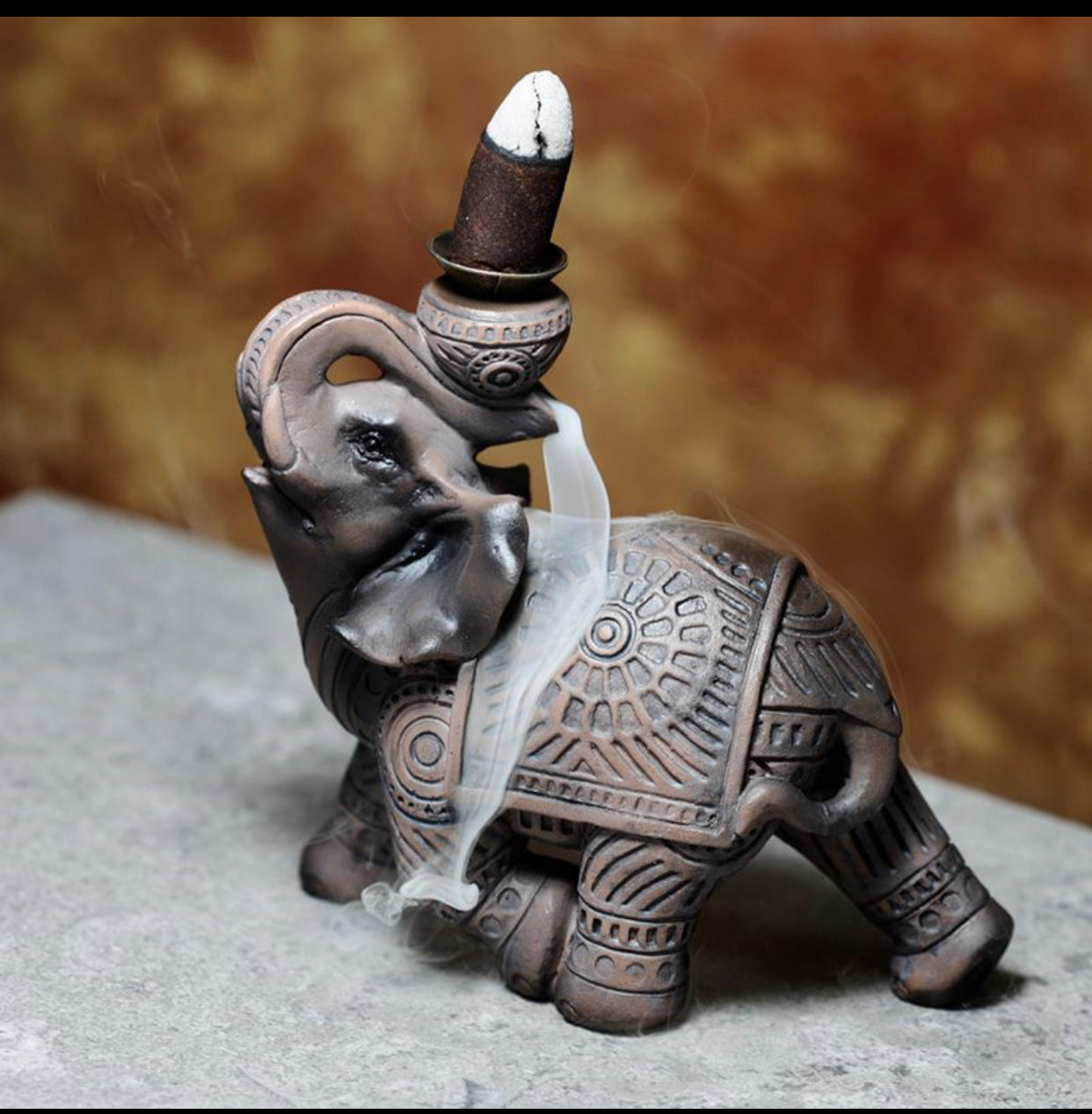 Wood effect backflow elephant burner