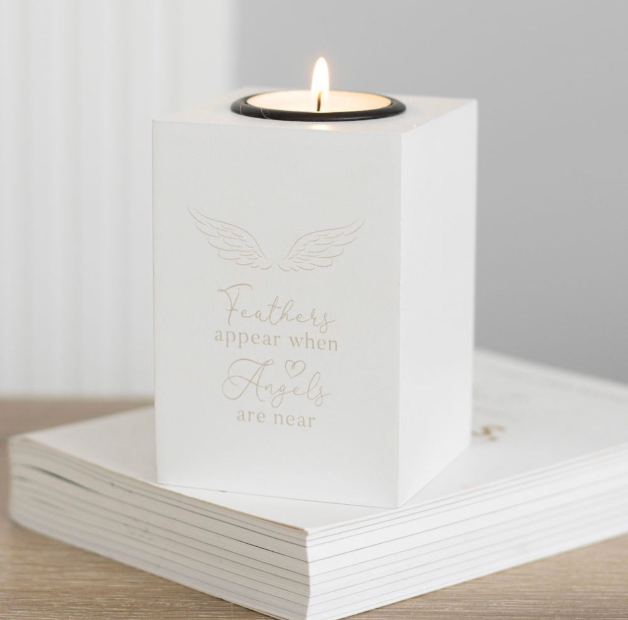 FEATHERS APPEAR ANGEL WING TEALIGHT HOLDER