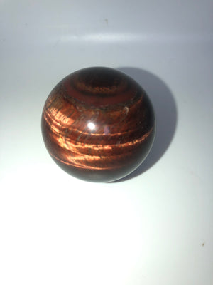 Red tigers eye sphere