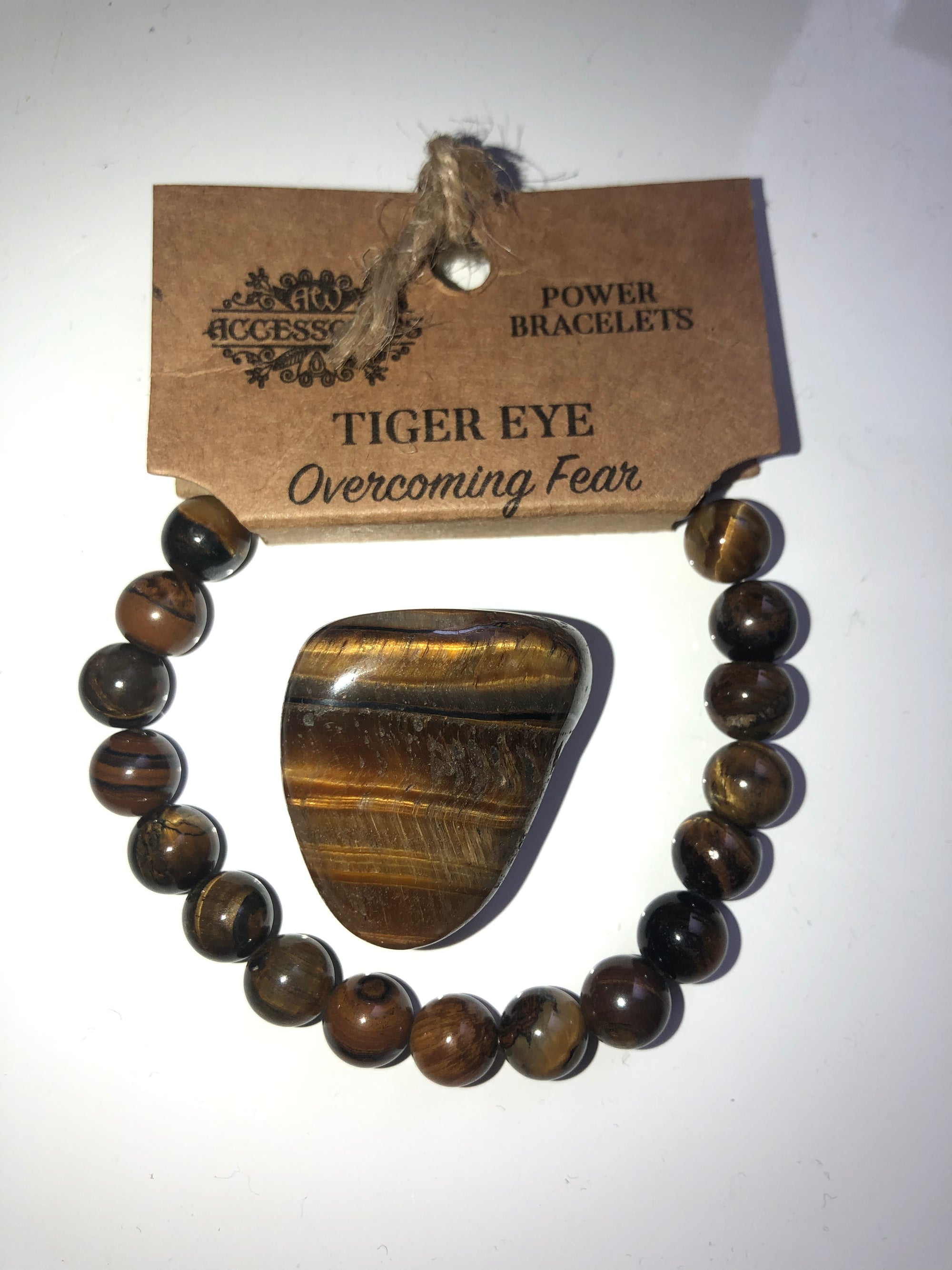 Tigers eye bracelet and tumble stone