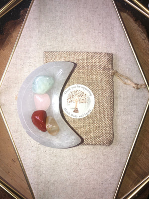 Crystal packs with selenite moon bowl