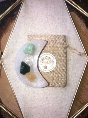 Crystal packs with selenite moon bowl