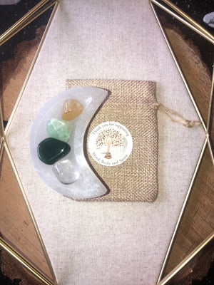 Crystal packs with selenite moon bowl